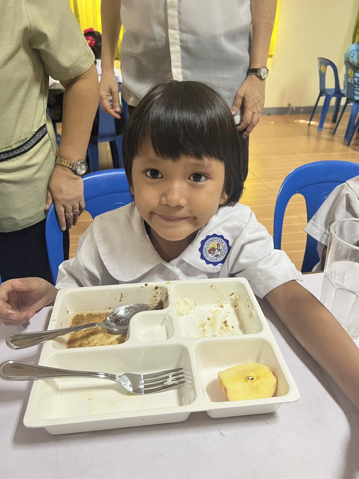 A young girl finished everything on her plate.