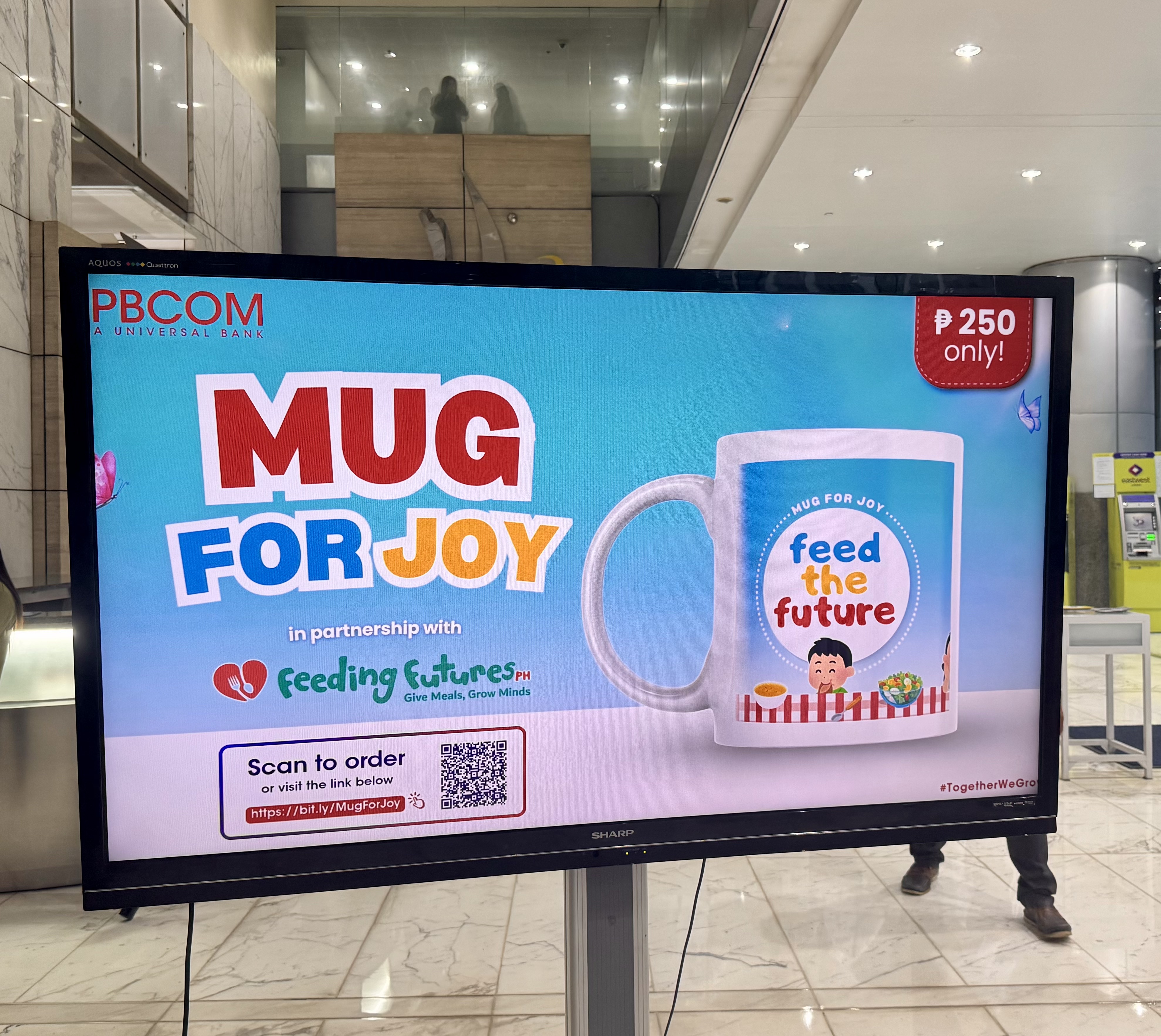 Digital display advertising the Mug for Joy initiative.